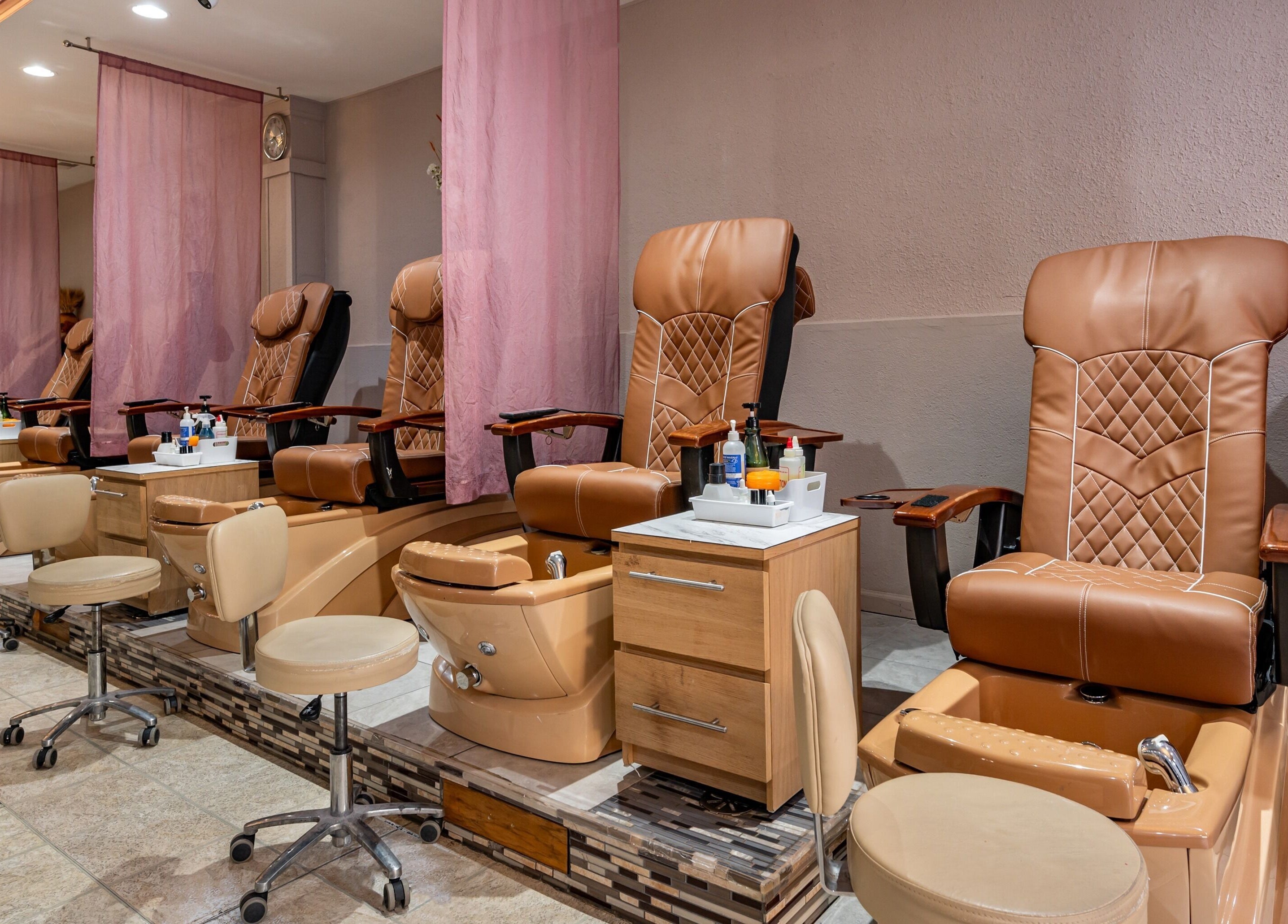 Luxurious pedicure chairs at Fresh Nails & Spa in Glen Ellyn, Illinois, US offer a relaxing experience.