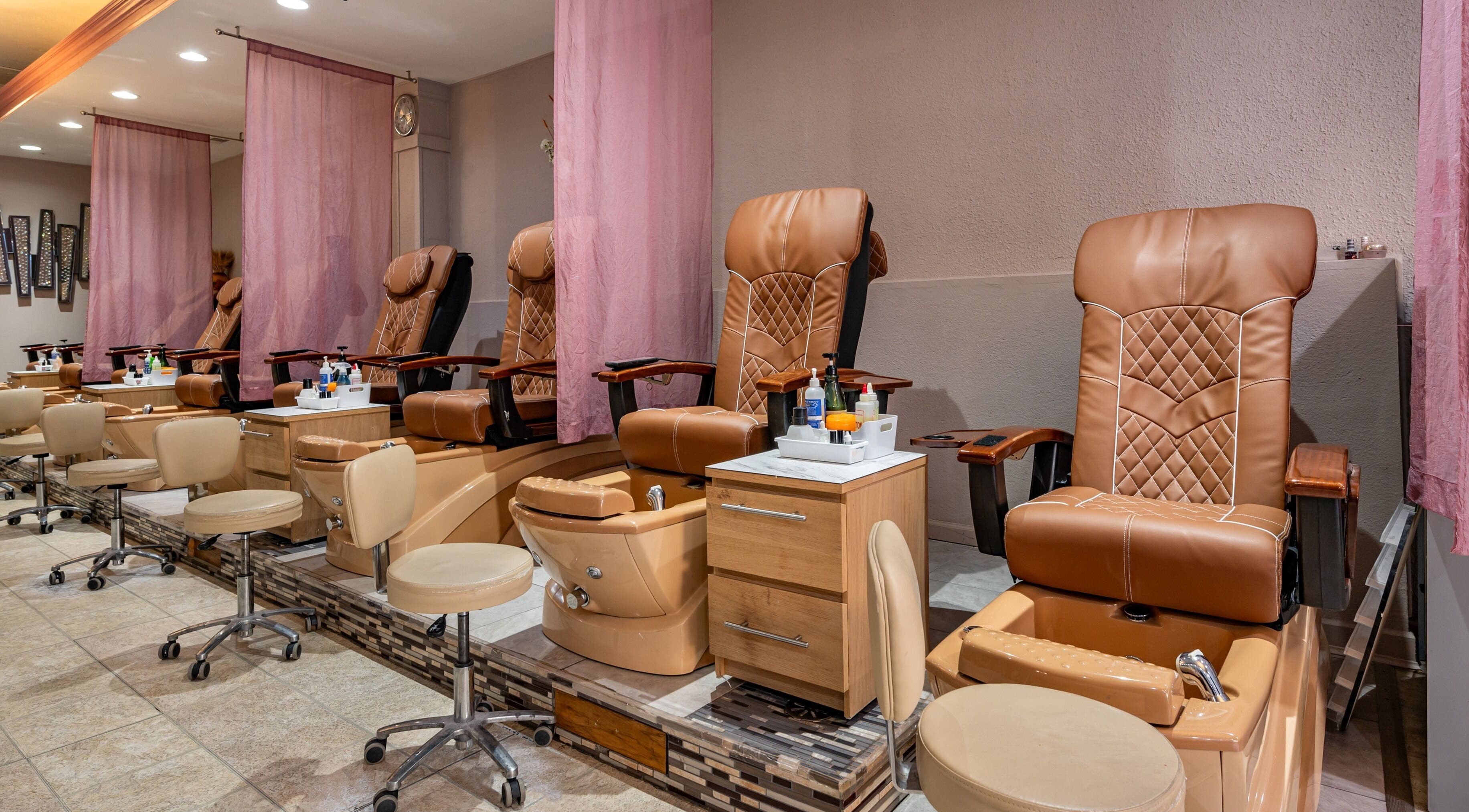Luxurious pedicure chairs at Fresh Nails & Spa in Glen Ellyn, Illinois, US offer a relaxing experience.