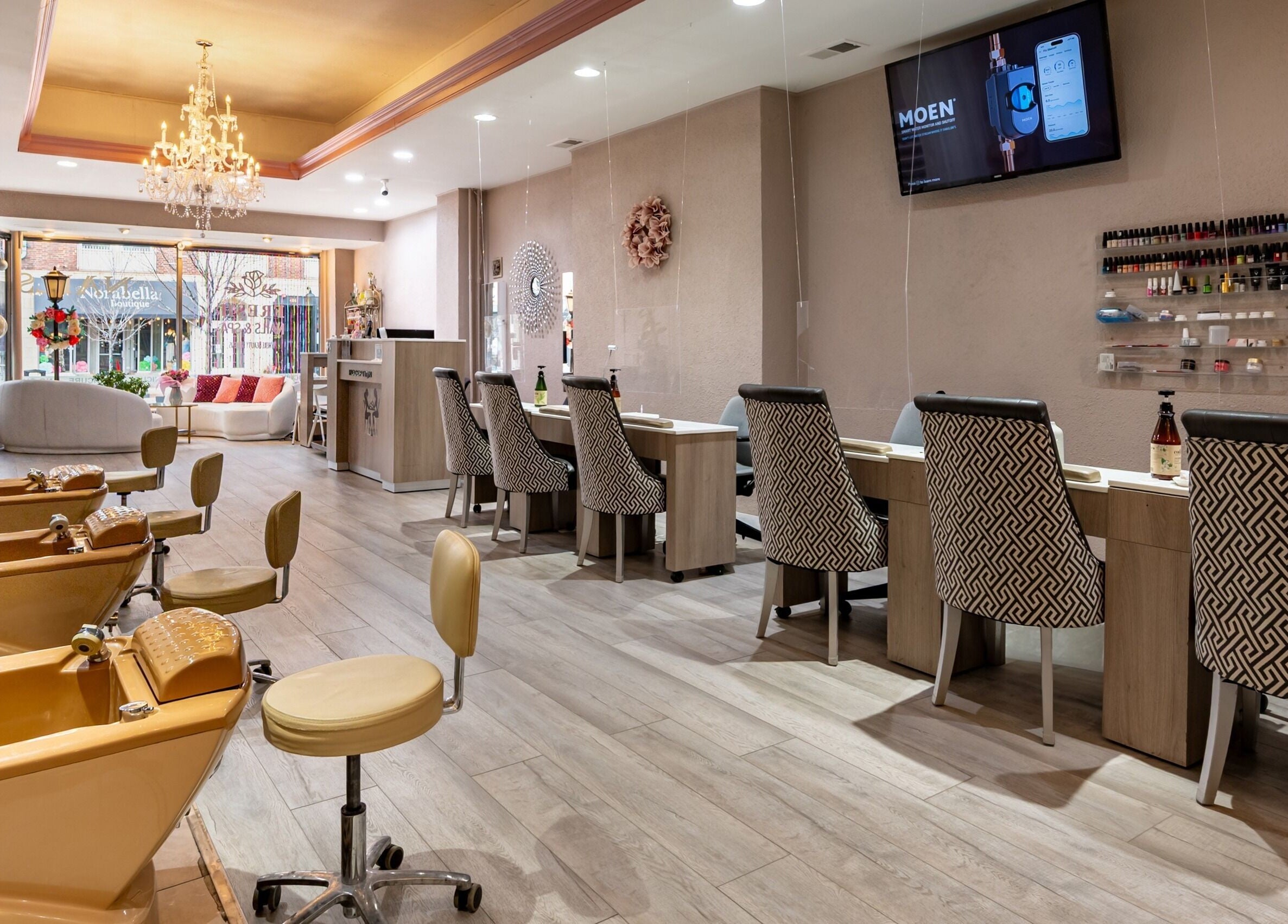Elegant interior of Fresh Nails & Spa in Glen Ellyn, Illinois, US featuring manicure stations and cozy decor.