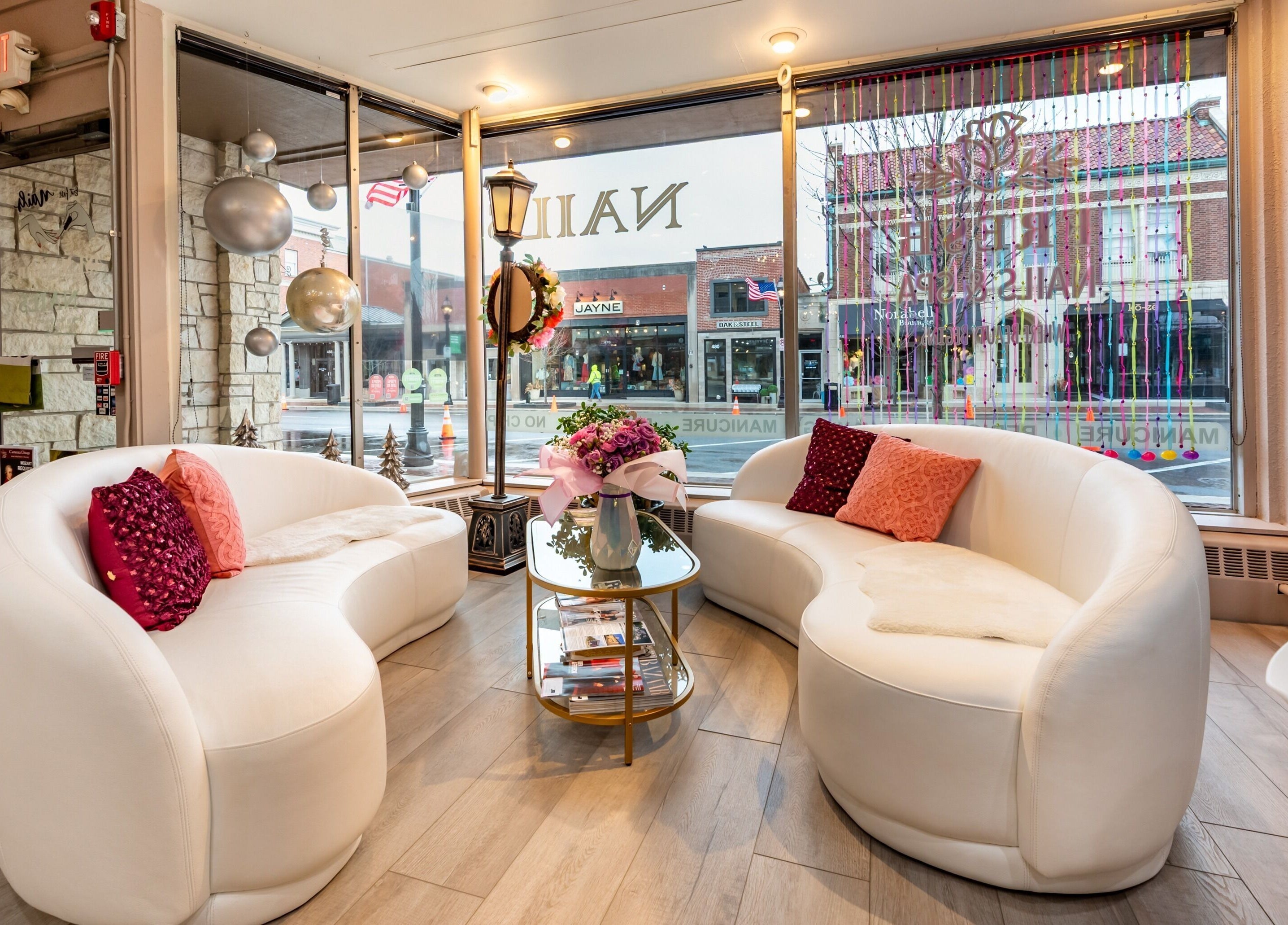 Inviting seating at Fresh Nails & Spa, Glen Ellyn, Illinois, US, with stylish decor and panoramic street views.