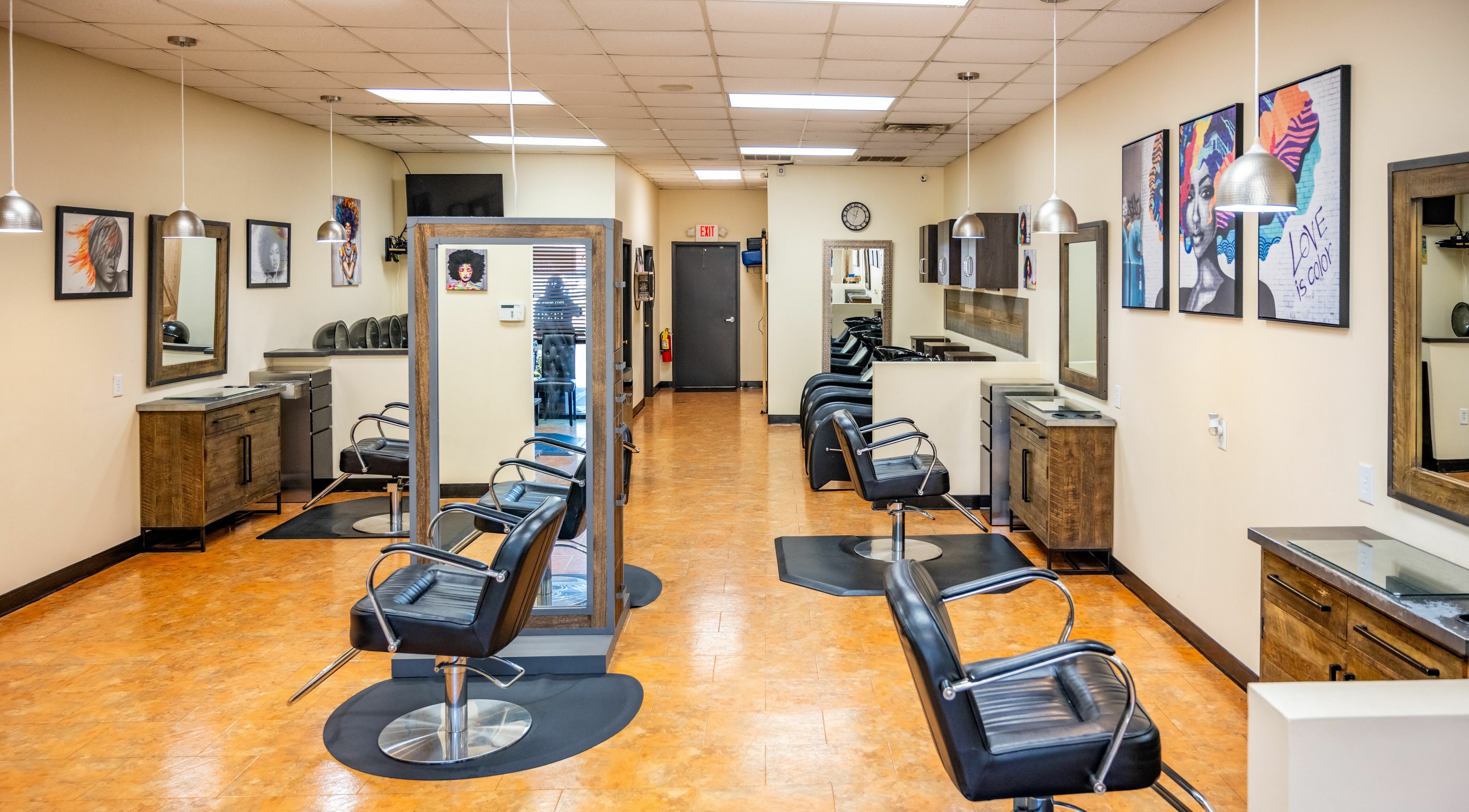 Interior of Family Hair Design & Barber in Buford, Georgia, US, showcasing modern salon chairs and decor.