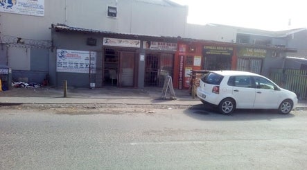 G&L Hair Salon and Nails storefront in Cape Town, Western Cape, ZA, with a white car parked in front.