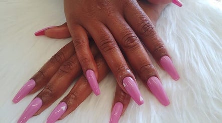 Elegant pink manicured nails at G&L Hair Salon and Nails, Cape Town, Western Cape, ZA, on a white surface.