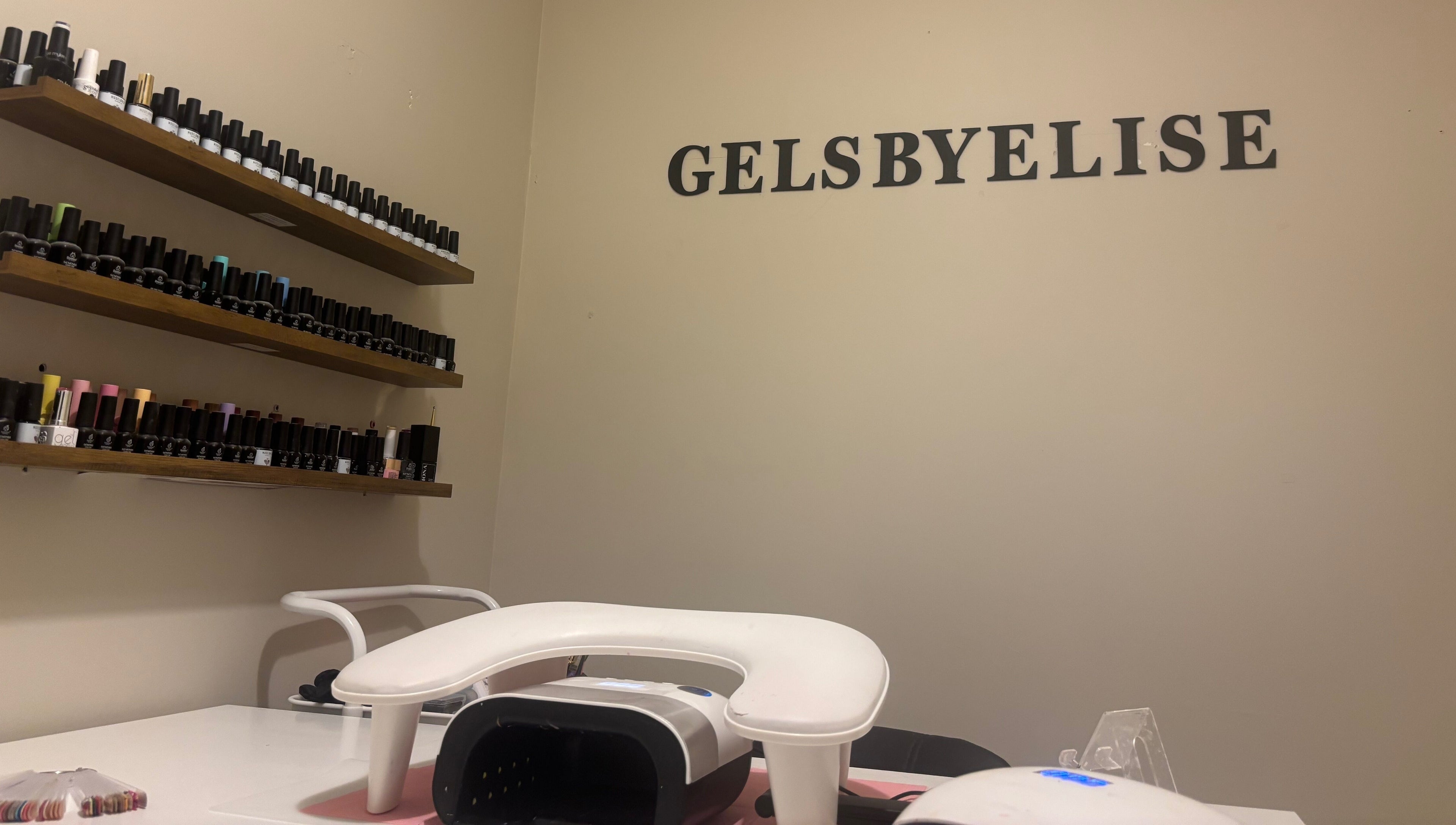 Gels by Elise in Forres, GB showcases nail polish collection and manicure station.