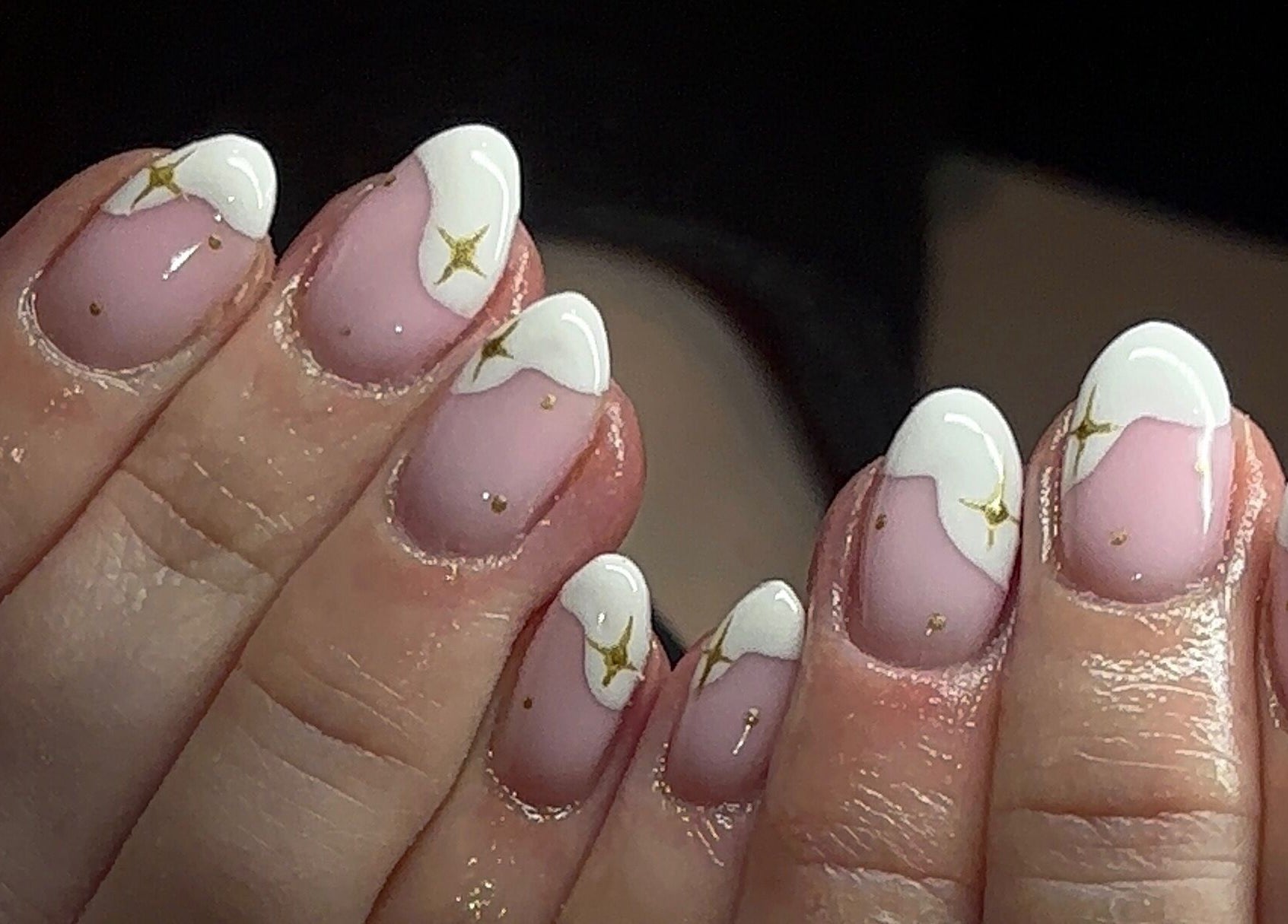 Stunning manicure with gold stars at Gels by Elise, Forres, GB.