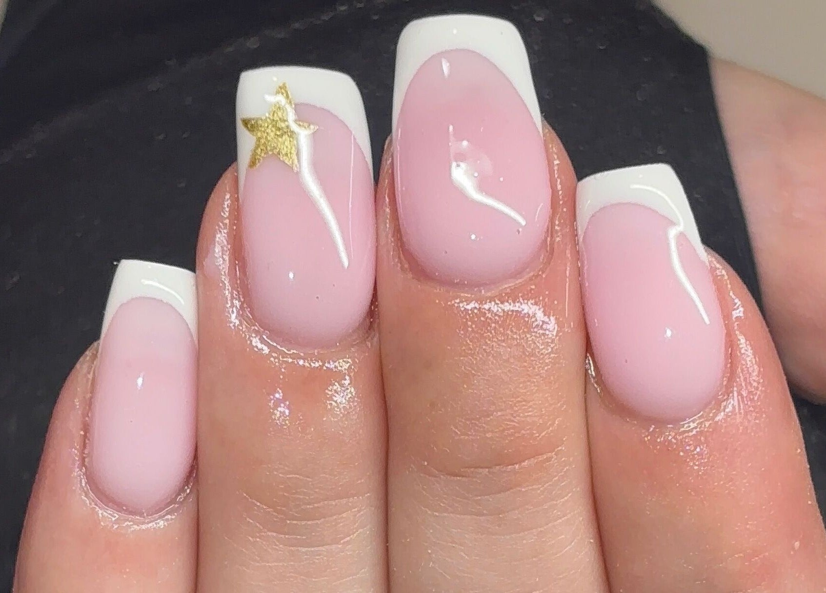 Pink and white manicure with gold star at Gels by Elise, Forres, GB.