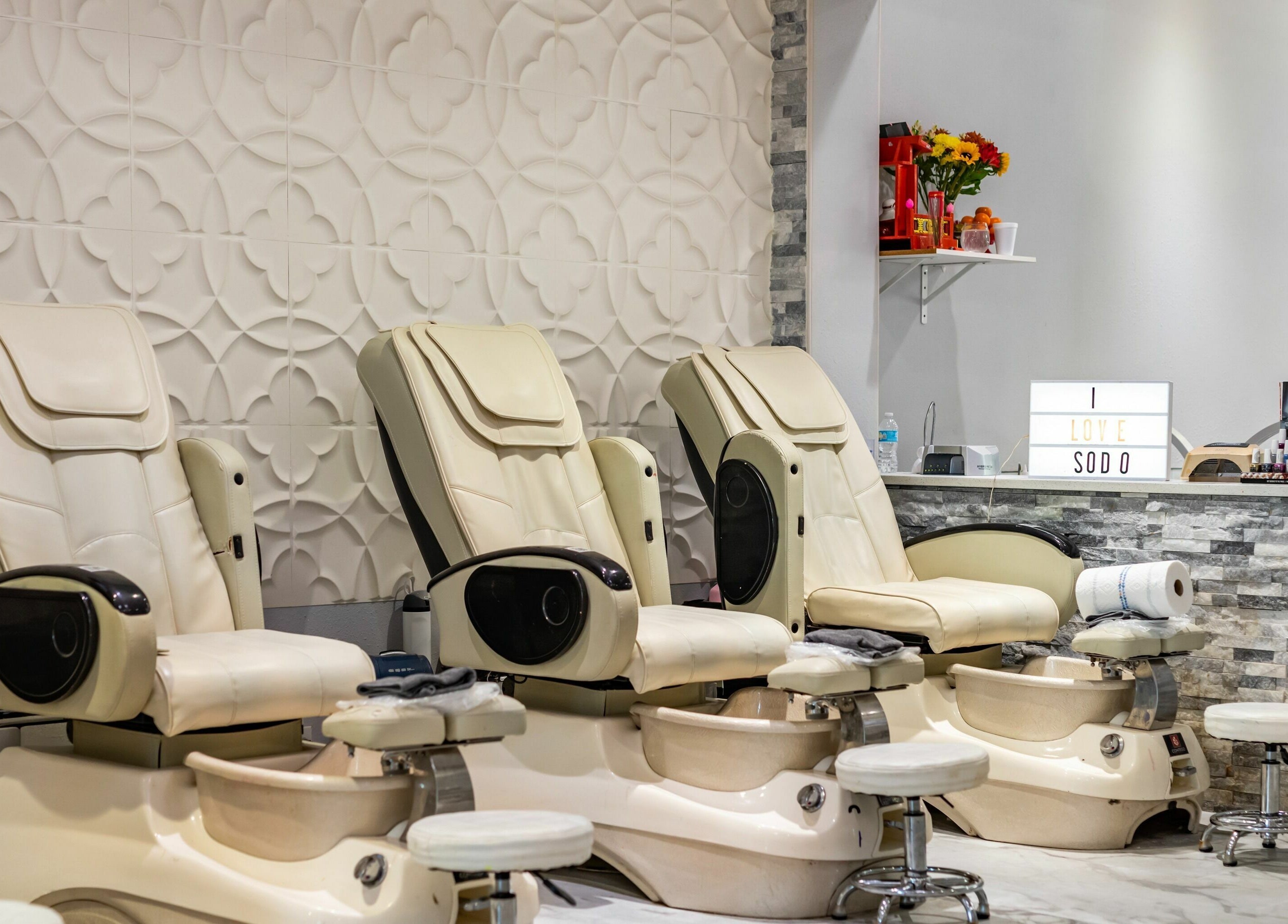 Luxurious pedicure chairs at SODO Nails & Lash Bar in Orlando, Florida, US, offer relaxation and style.