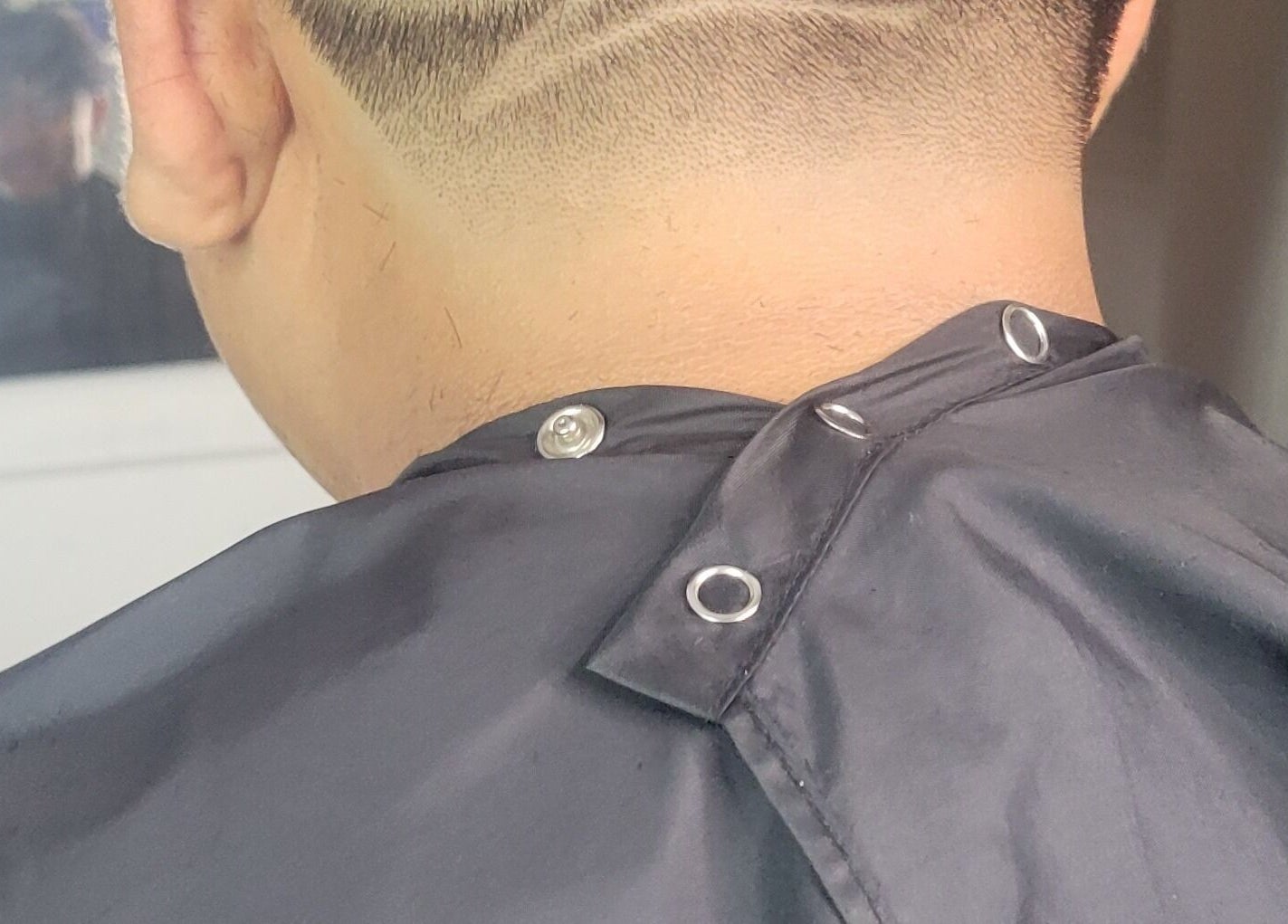 Close-up of a stylish haircut at VINCE'S CHOPS, Montréal, Québec, CA.