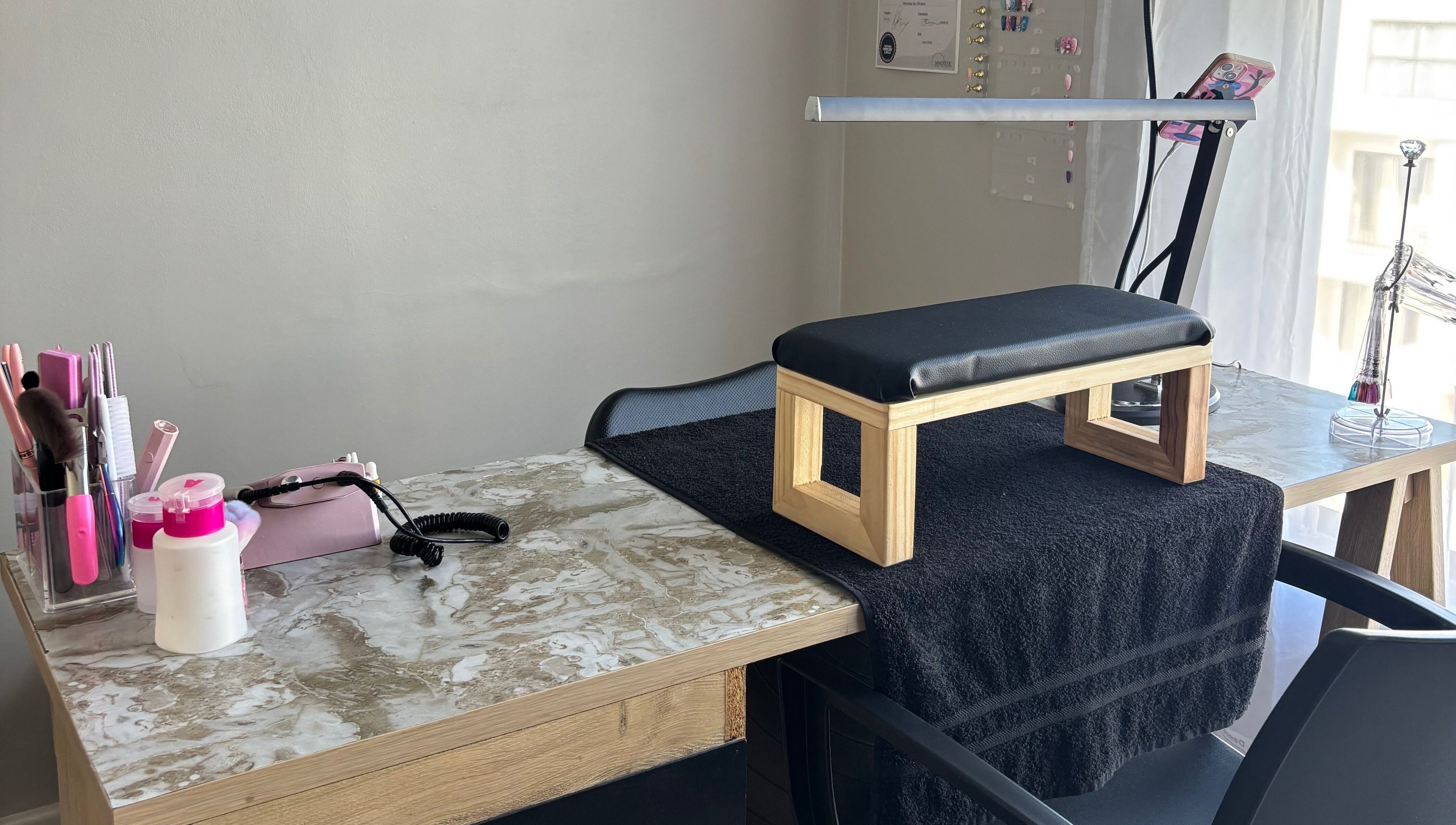 Nail station setup at Vee Oli Nails, Johannesburg, Gauteng, ZA, featuring modern manicure tools.