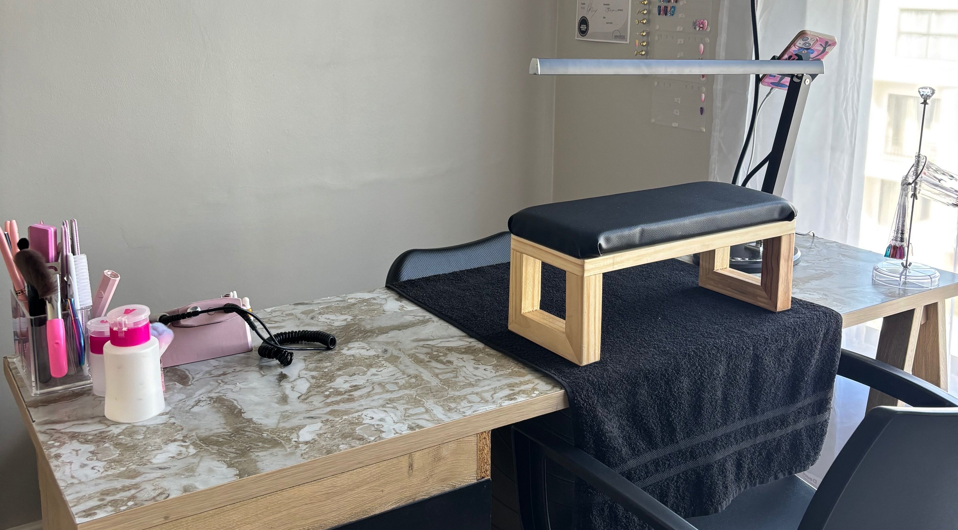 Nail station setup at Vee Oli Nails, Johannesburg, Gauteng, ZA, featuring modern manicure tools.