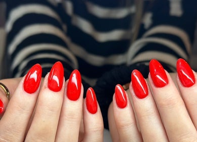 Vibrant red manicure at Anne Lima Nails & Beauty (Dublin 2), Dublin, County Dublin, IE.