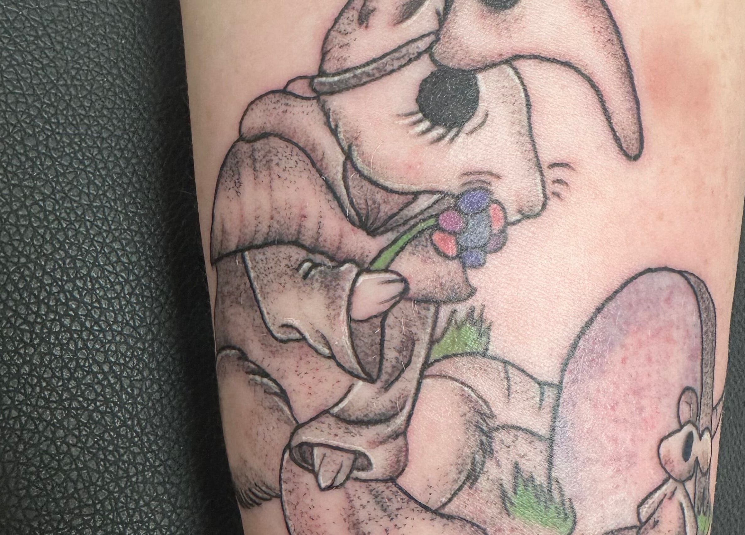 Whimsical tattoo design on skin at K. Tabone Tattoo, Rochester, New York, US.