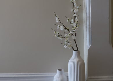 Elegant white vases with blossoms at The Head Spa Perth, South Perth, Western Australia, AU.