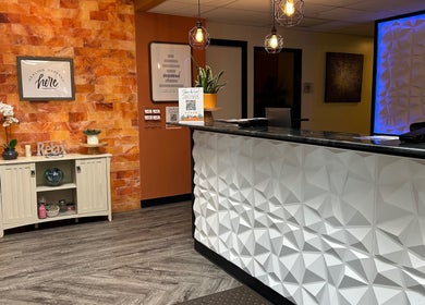 Welcoming reception at Revive Integrative Wellness | Abilene, Texas, US with modern decor and warm lighting.