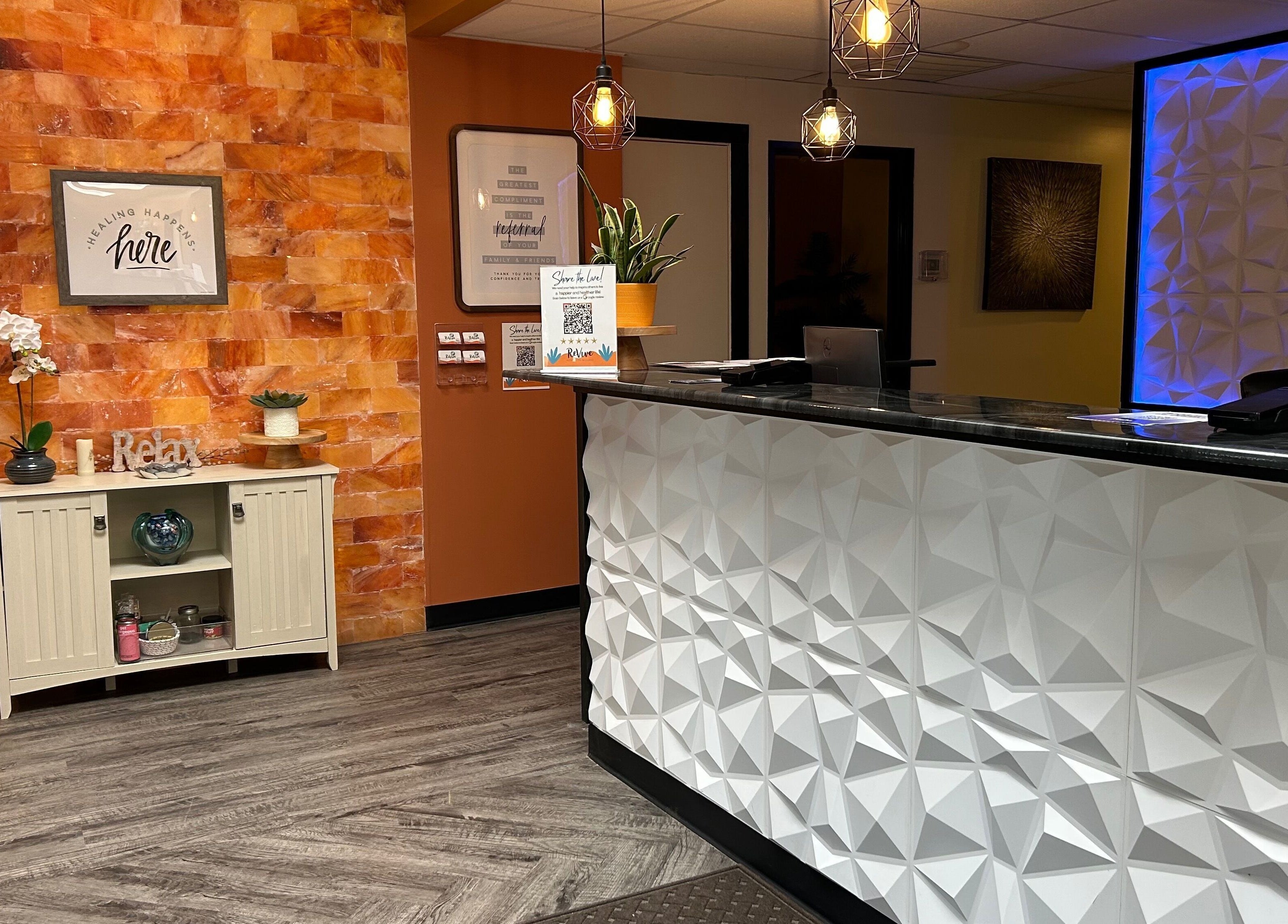 Reception area at Revive Integrative Wellness in Abilene, Texas features a warm, inviting design.