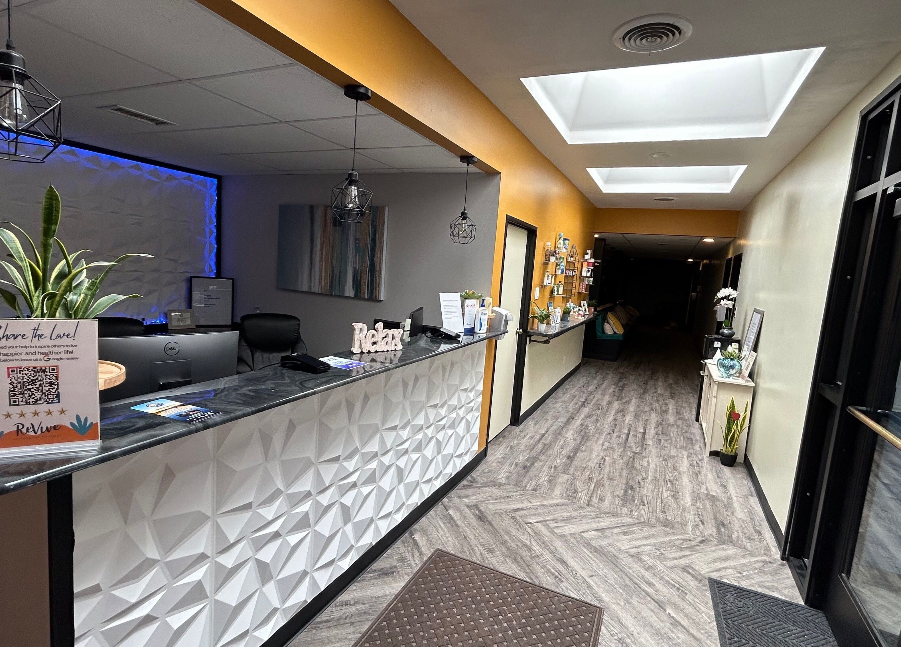 Modern reception at Revive Integrative Wellness in Abilene, Texas, US, featuring stylish decor and a welcoming atmosphere.