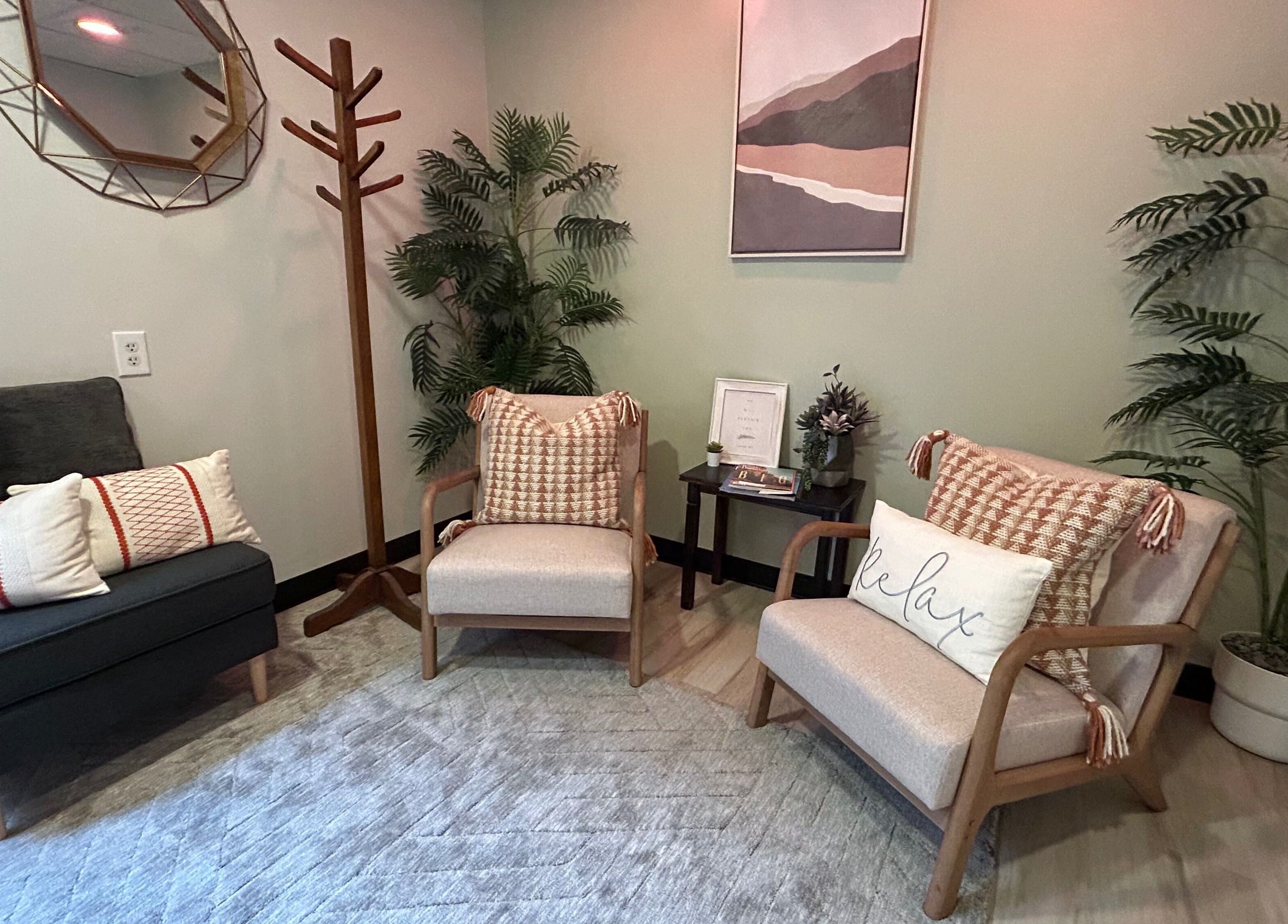 Cozy seating area at Revive Integrative Wellness | Abilene, featuring elegant decor and soft lighting. Abilene, Texas, US.