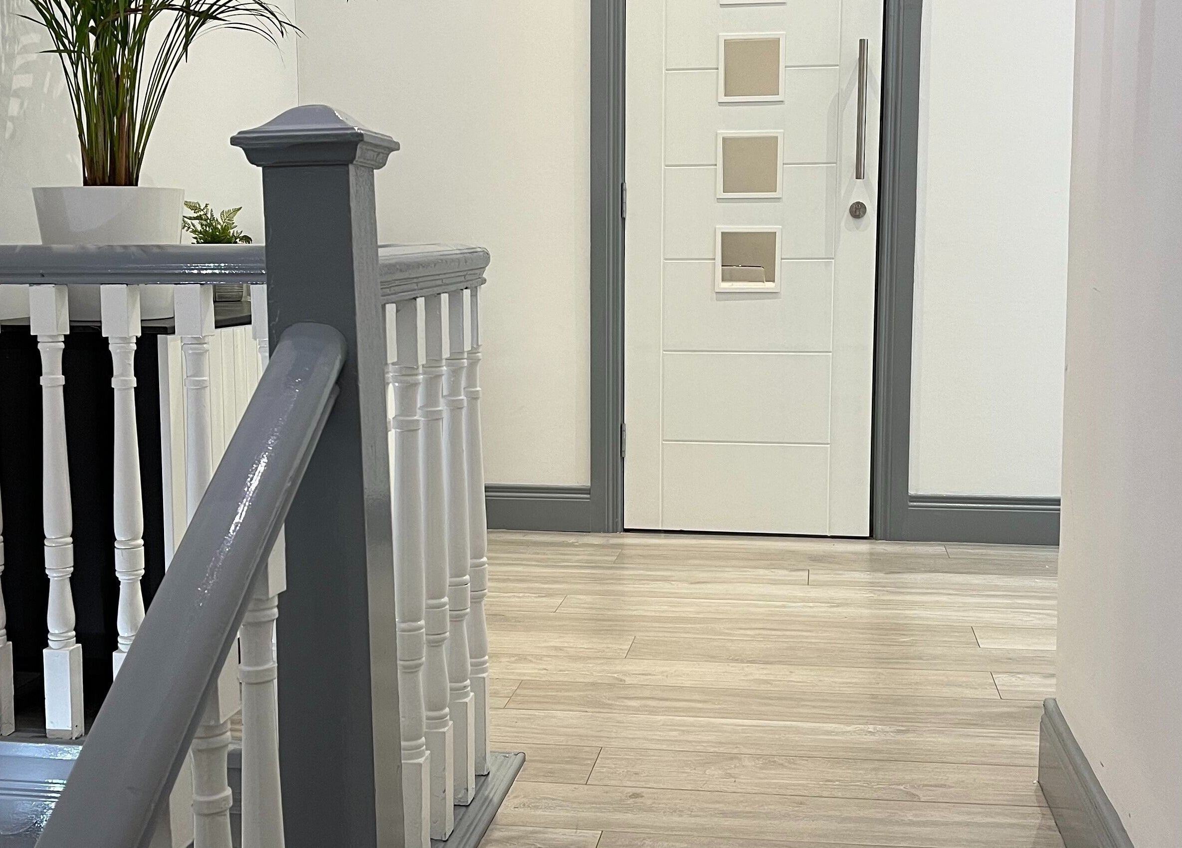 Elegant hallway with wooden details at Vivo Body Studio Belfast, Northern Ireland, GB.