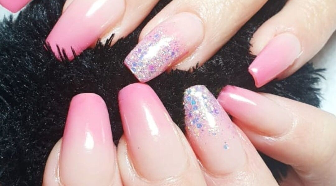 Stylish pink and glitter nails at Baroness Beauty, Vanderbijlpark, Gauteng, ZA.