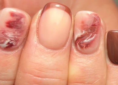 Elegant marble nail design at Beauty By Eloise, Godshill, England, GB, showcasing intricate artistry.
