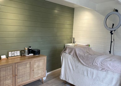 Relaxing treatment room at Beauty By Eloise, Godshill, England. Featuring cozy bed and aesthetic decor.