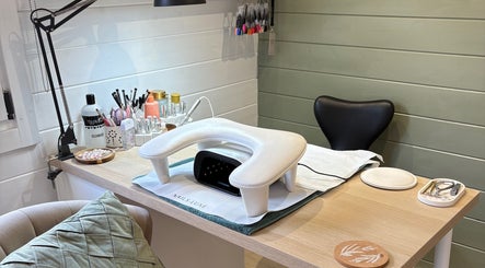 Modern manicure setup at Beauty By Eloise in Godshill, England, GB, featuring nail tools and products.