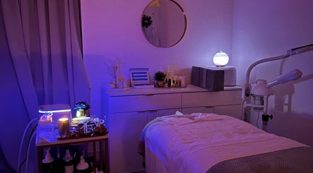 Serene wellness room at Reenas Touch, a beauty venue in London, England, GB, featuring calming decor and treatment bed.