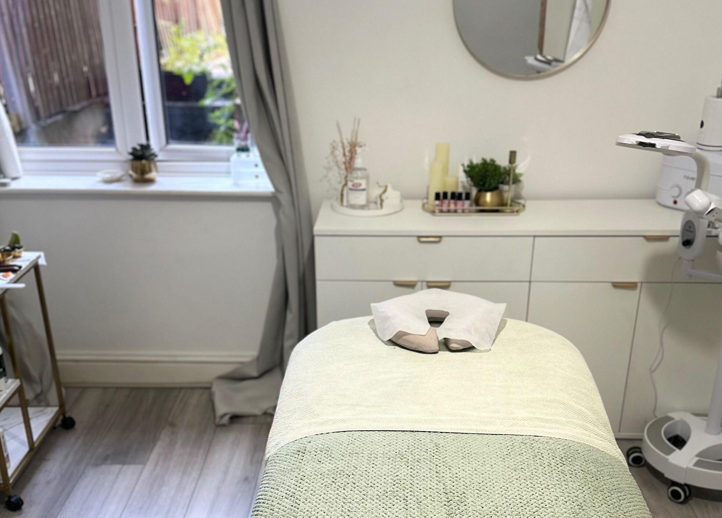 Tranquil treatment room at Reena’s Touch, London, England, GB, showcasing a peaceful spa experience.