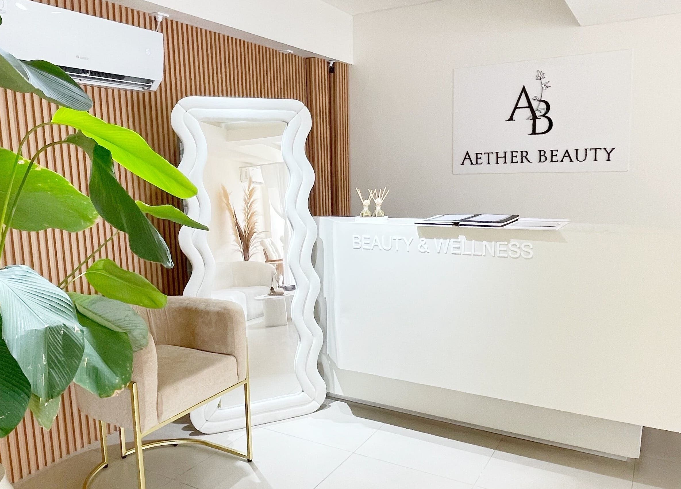 Reception at Aether Beauty in Bali, ID with modern decor and greenery.