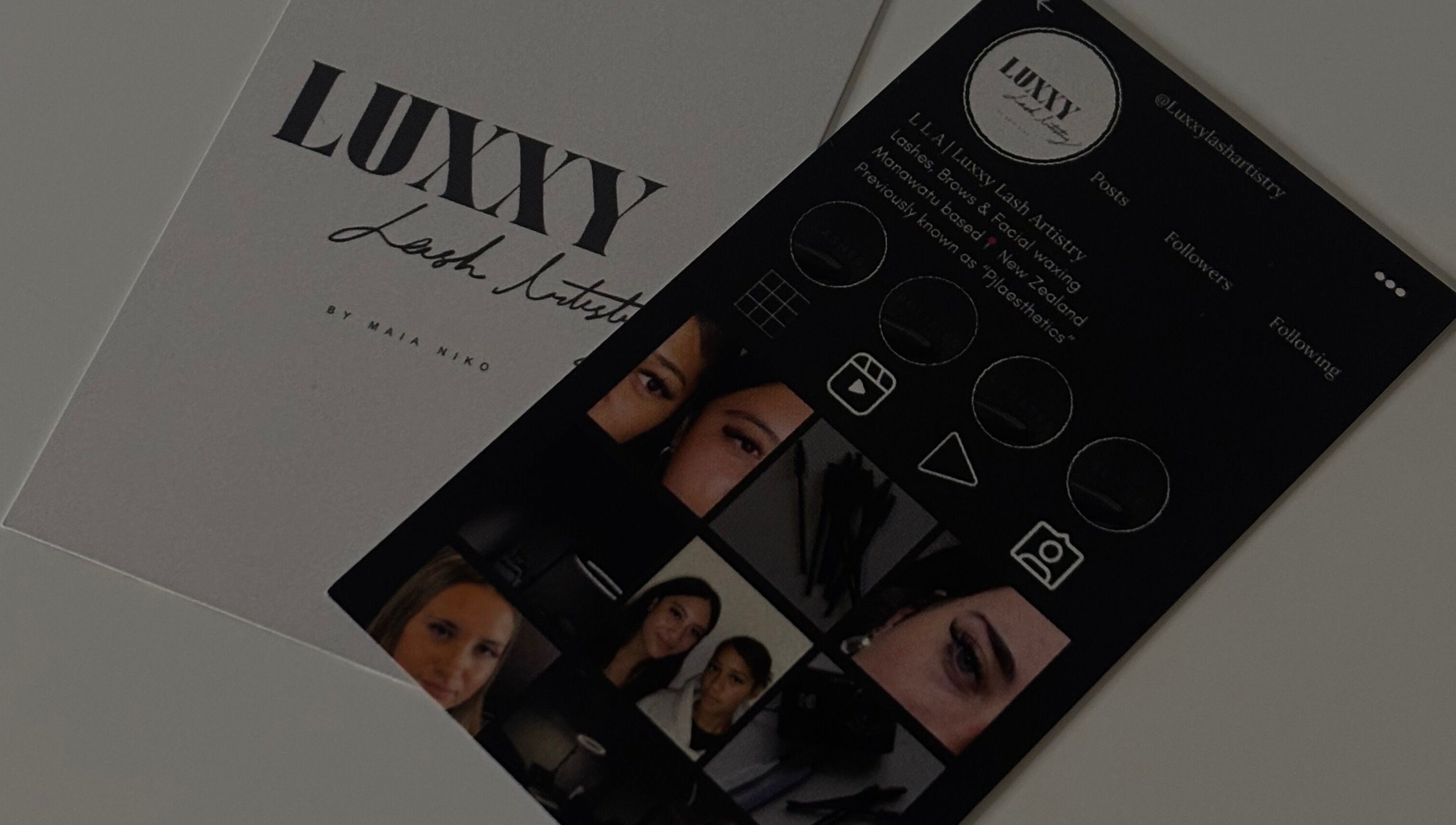 Luxxy Lash Artistry promotional cards displayed in Levin, Manawatū-whanganui, NZ highlighting beauty services.