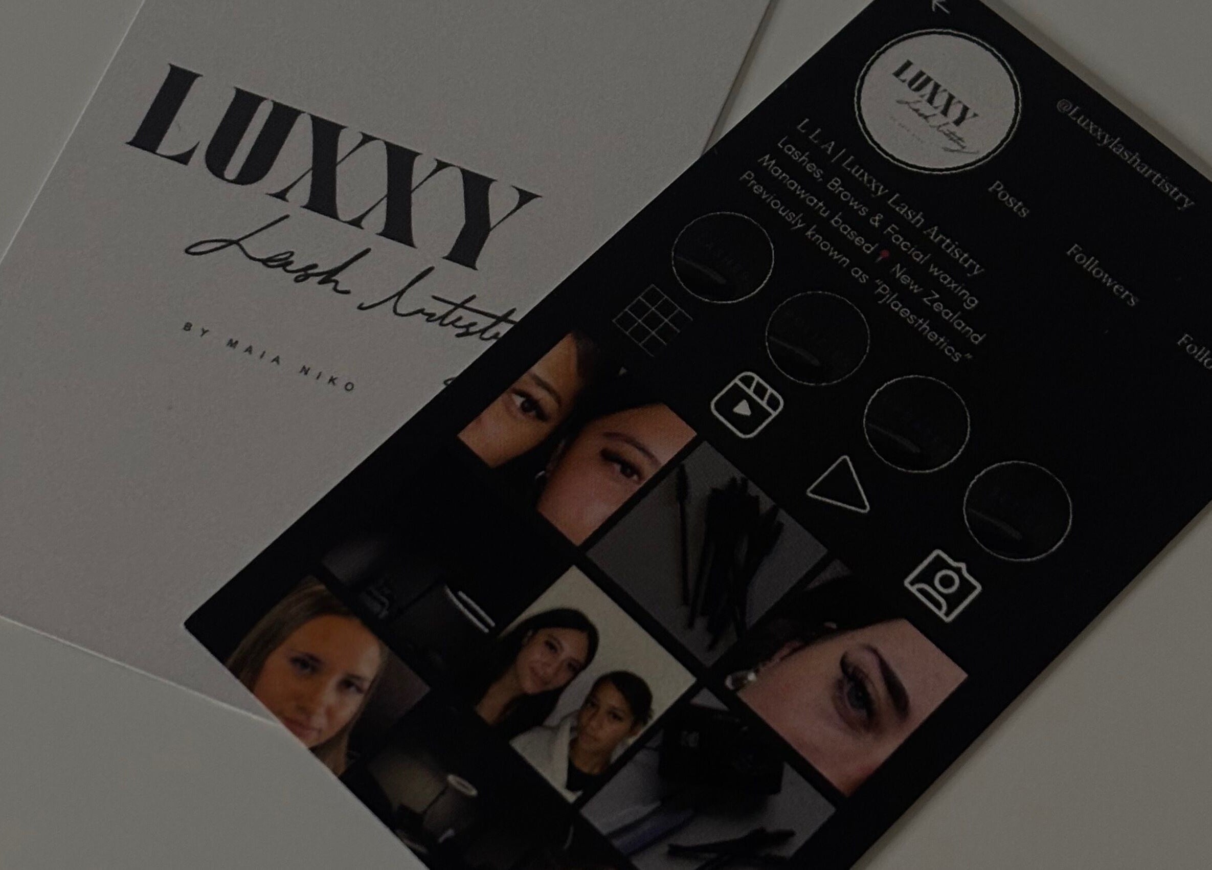 Luxxy Lash Artistry promotional cards displayed in Levin, Manawatū-whanganui, NZ highlighting beauty services.