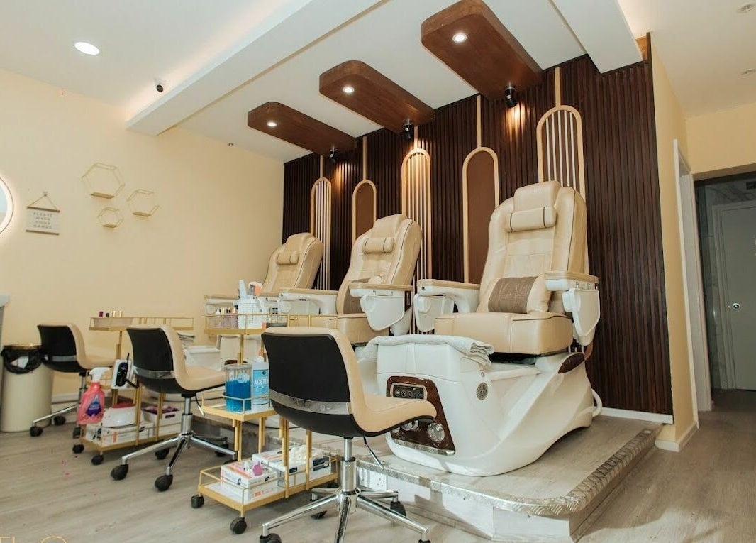 Lux Nail Spa & Beauty in London offers plush pedicure chairs in a serene, elegant setting. Perfect for relaxation.