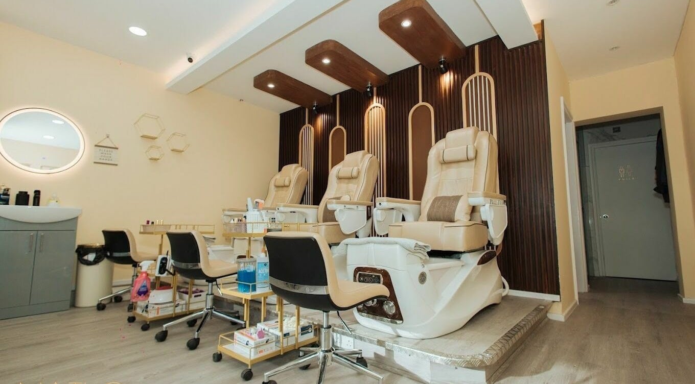 Lux Nail Spa & Beauty in London offers plush pedicure chairs in a serene, elegant setting. Perfect for relaxation.