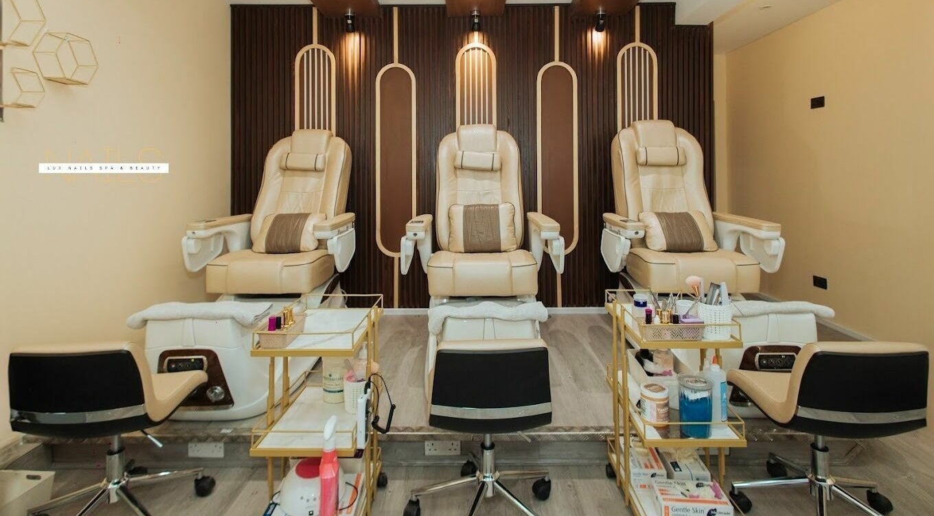 Lux Nail Spa & Beauty in London, England, GB features luxurious pedicure chairs and spa equipment.