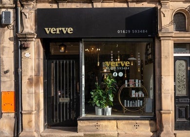Street view of Verve in Matlock, England showcasing elegant shopfront and warm interiors.