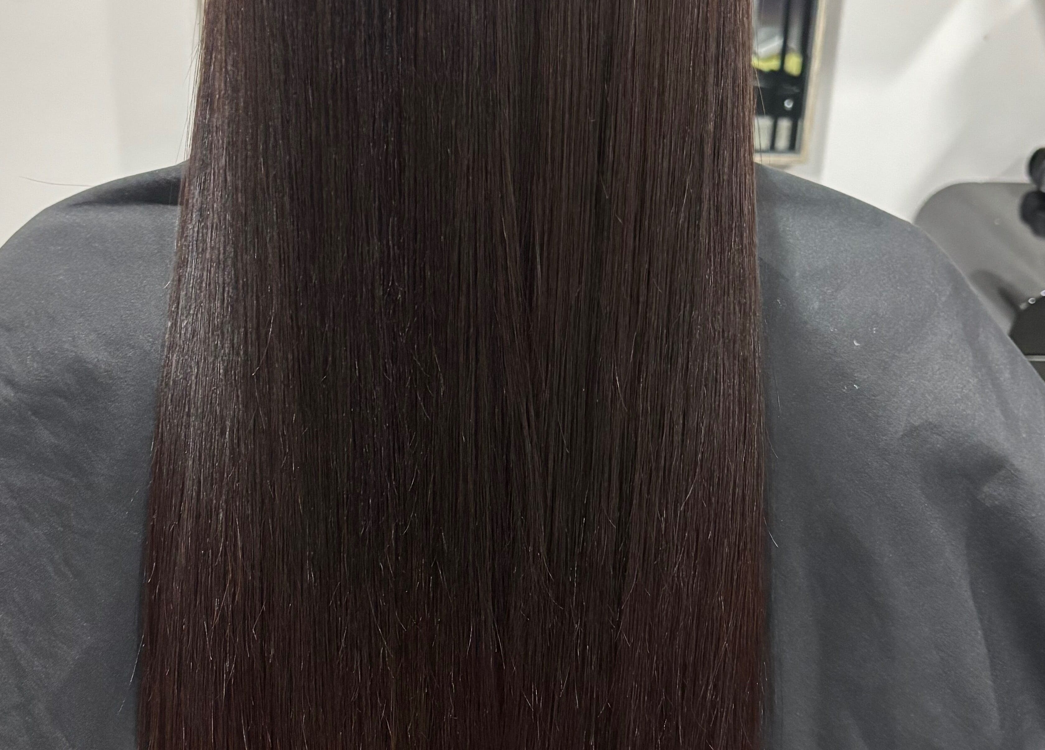 Smooth, glossy brown hair treatment at Rah, Hastings, Hawke's Bay, NZ.