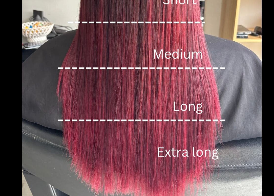 Long crimson hair at Rah salon in Hastings, Hawke's Bay, NZ with length markers for short, medium, long, extra long.