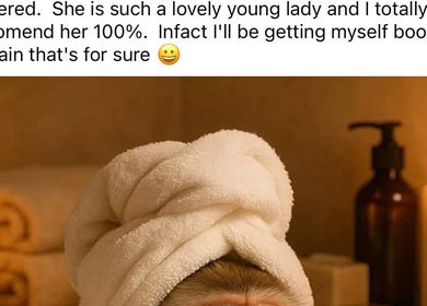 Relax at Dollified Hair & Beauty, England, England, GB with candles and towels creating a serene spa vibe.
