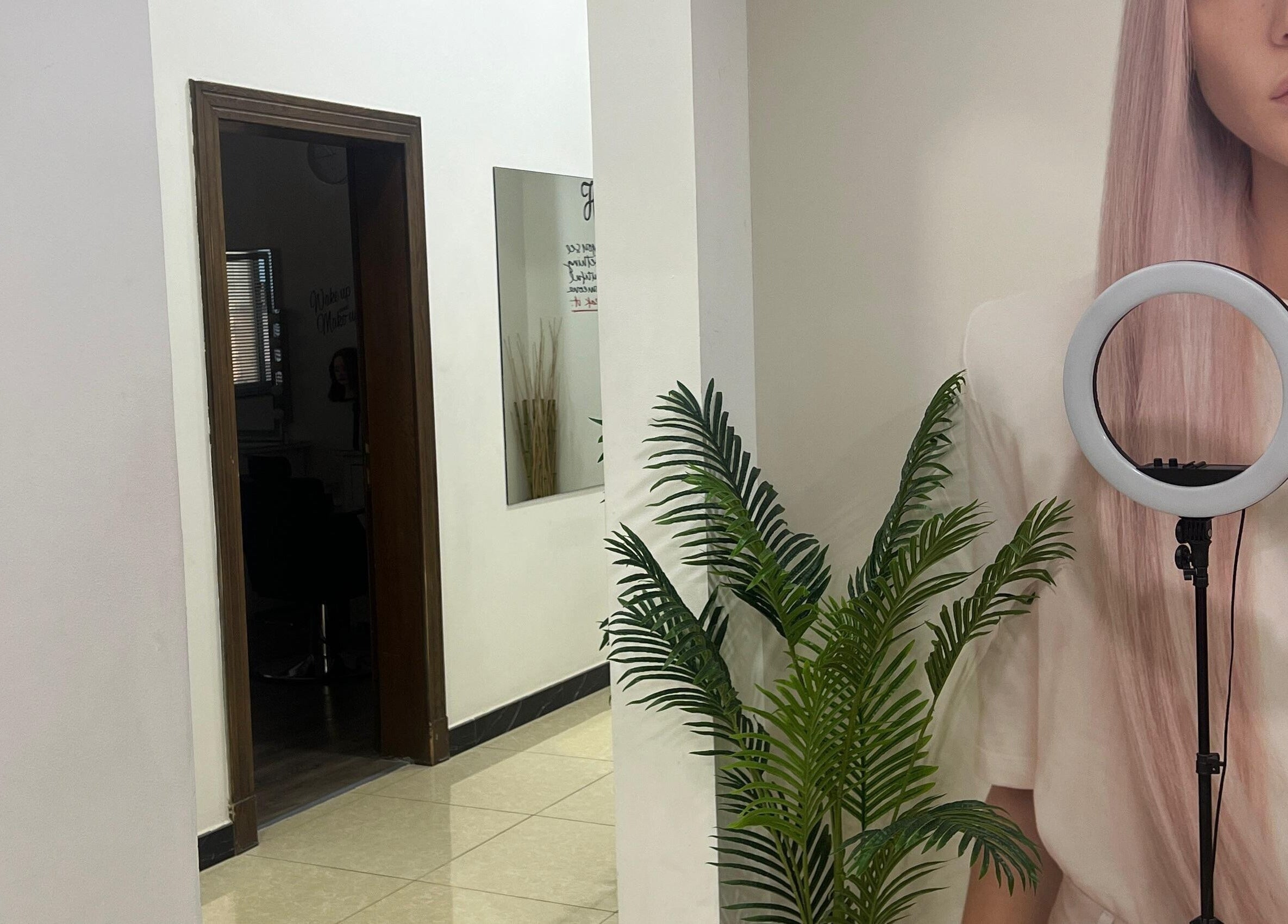 Interior of Dame Salon & Spa in Muharraq Governorate, BH with elegant decor and greenery.