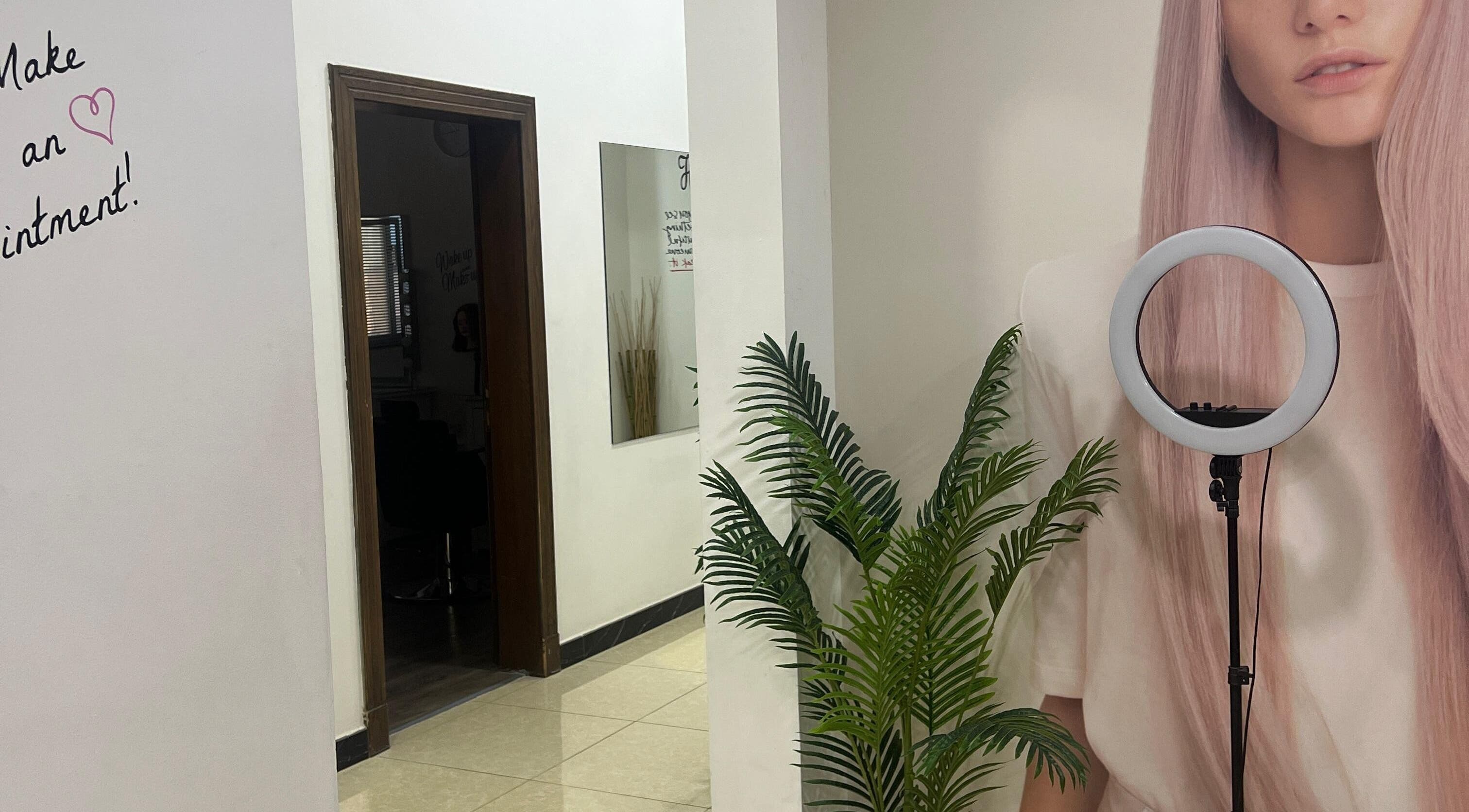 Interior of Dame Salon & Spa in Muharraq Governorate, BH with elegant decor and greenery.