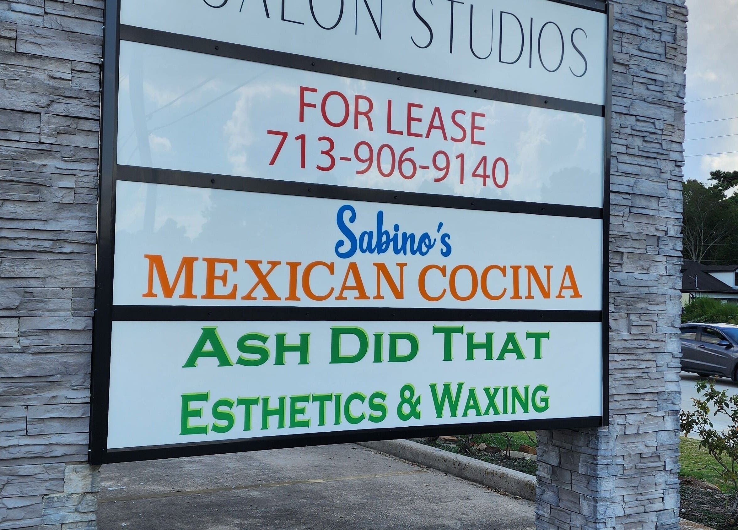Street view of Ash Did That Esthetics & Waxing sign in Humble, Texas, US, promoting beauty services.