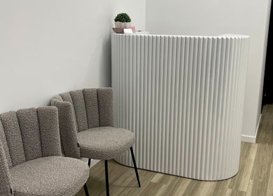 Elegant reception area at Beauty by B, Echuca, Victoria, AU with modern decor and cozy seating.