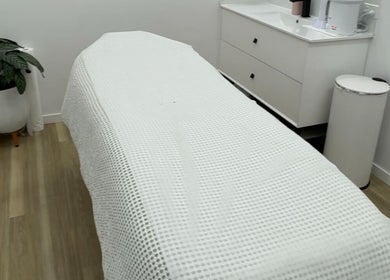 Relaxing spa room at Beauty by B in Echuca, Victoria, AU, featuring a cozy treatment bed and calming decor.