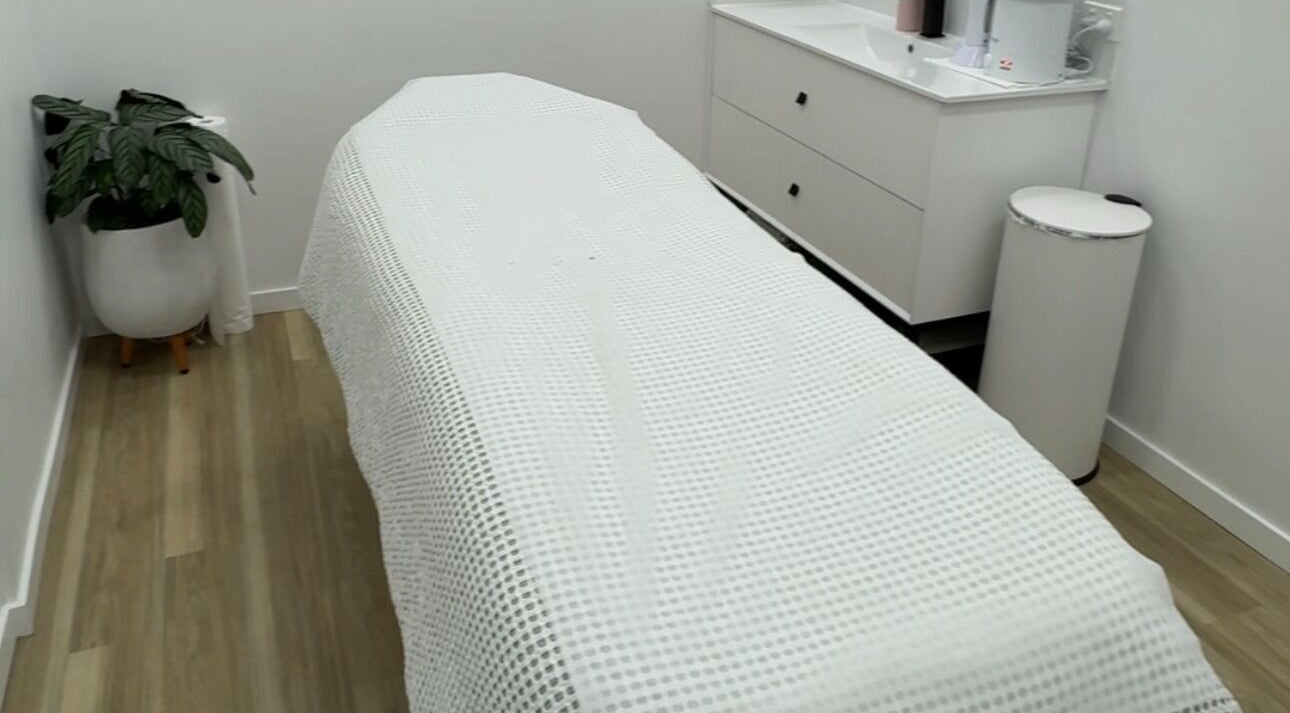 Relaxing spa room at Beauty by B in Echuca, Victoria, AU, featuring a cozy treatment bed and calming decor.
