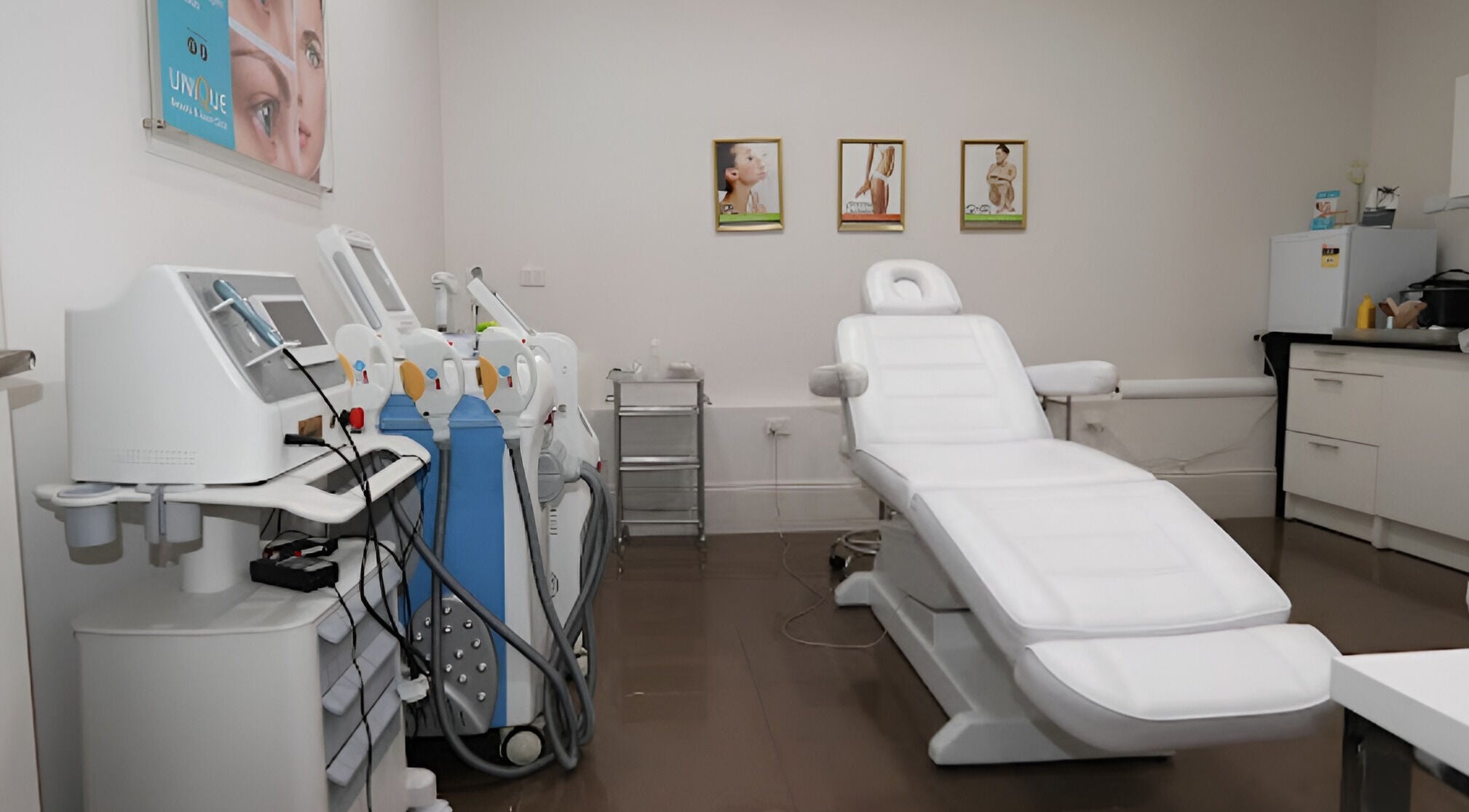 Modern treatment room at Unique Beauty and Laser Clinic in Kilburn, South Australia, AU. Features advanced equipment.