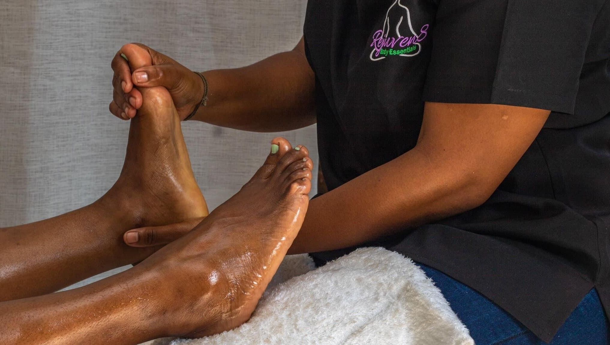 Foot massage at Rejuven8 Herbals, Ballito, Kwazulu-natal, ZA, promoting relaxation and wellness.