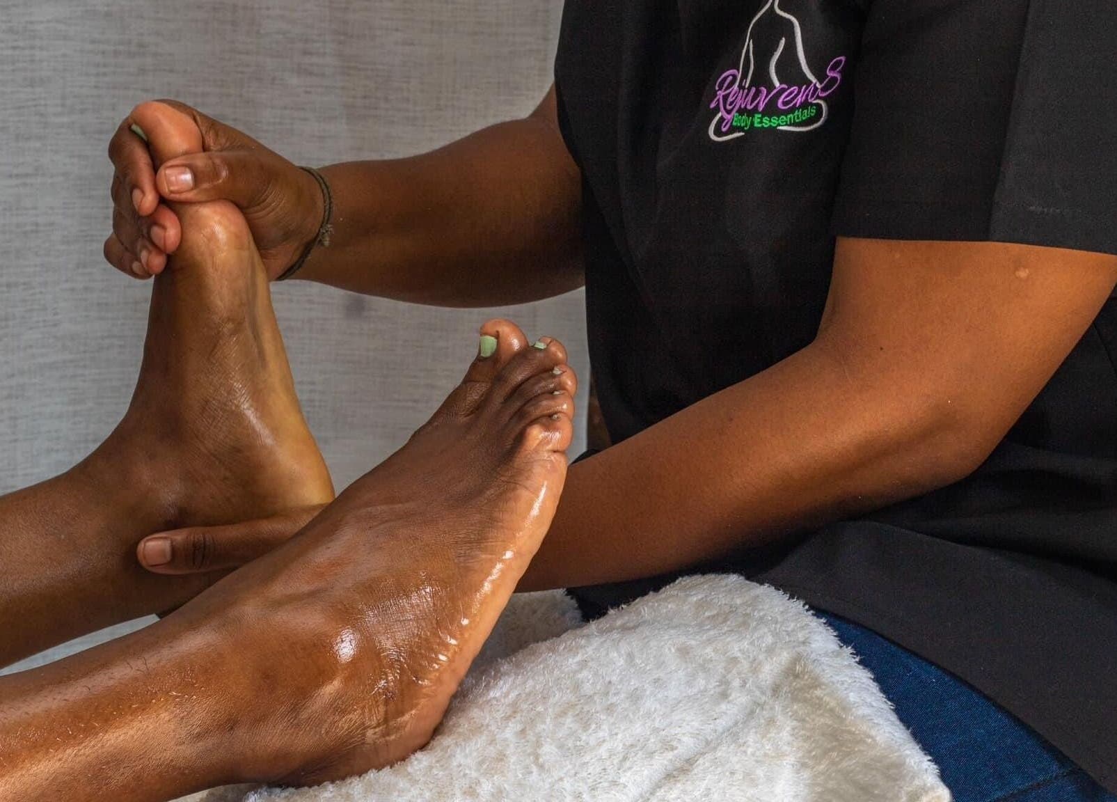 Foot massage at Rejuven8 Herbals, Ballito, Kwazulu-natal, ZA, promoting relaxation and wellness.