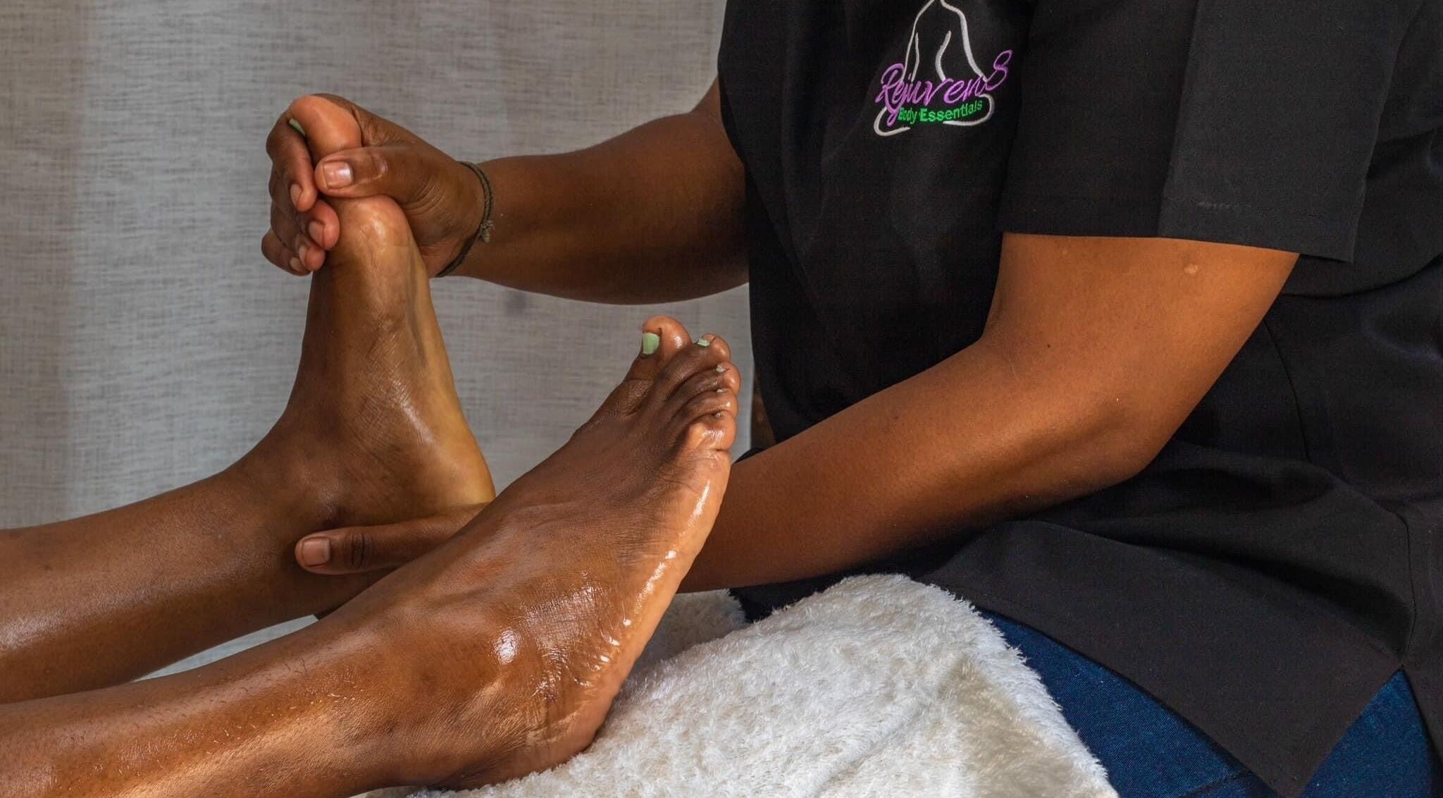 Foot massage at Rejuven8 Herbals, Ballito, Kwazulu-natal, ZA, promoting relaxation and wellness.