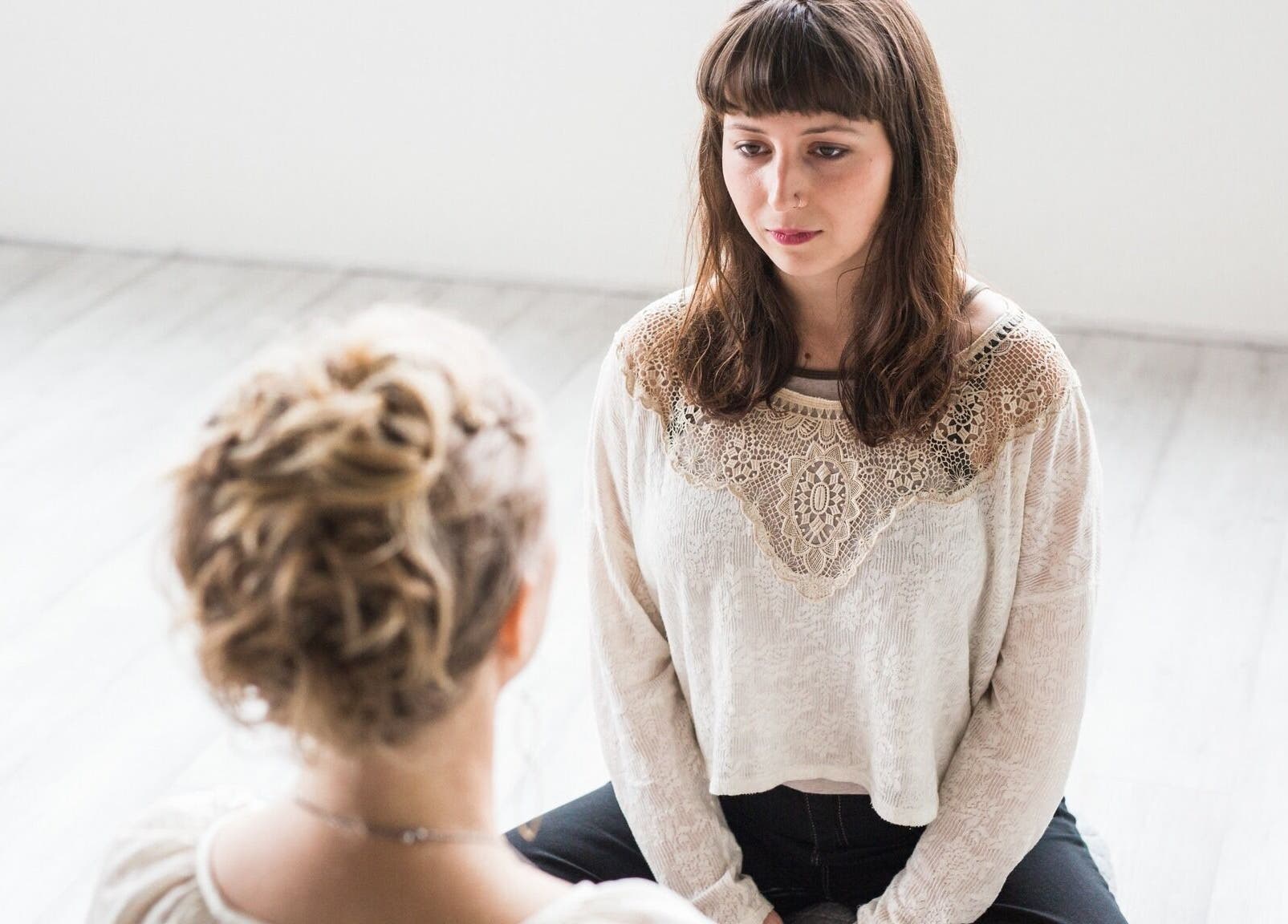 Two women meditate at Sage Therapeutic Soul Spa, Tahoe City, California, US, fostering relaxation and mindfulness.
