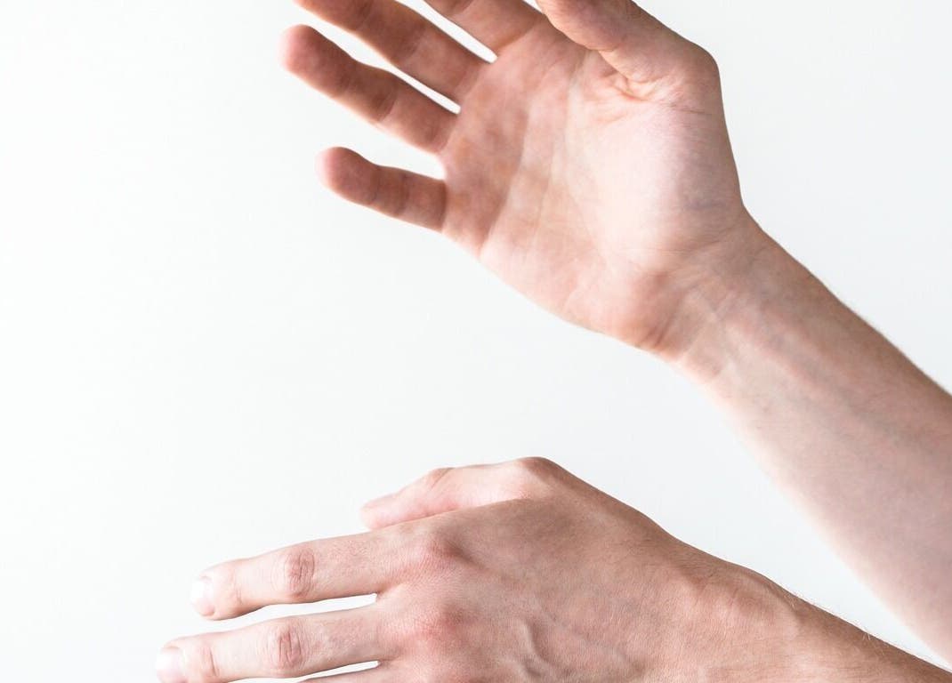 Healing hands at Sage Therapeutic Soul Spa in Tahoe City, California, US offering wellness treatments.